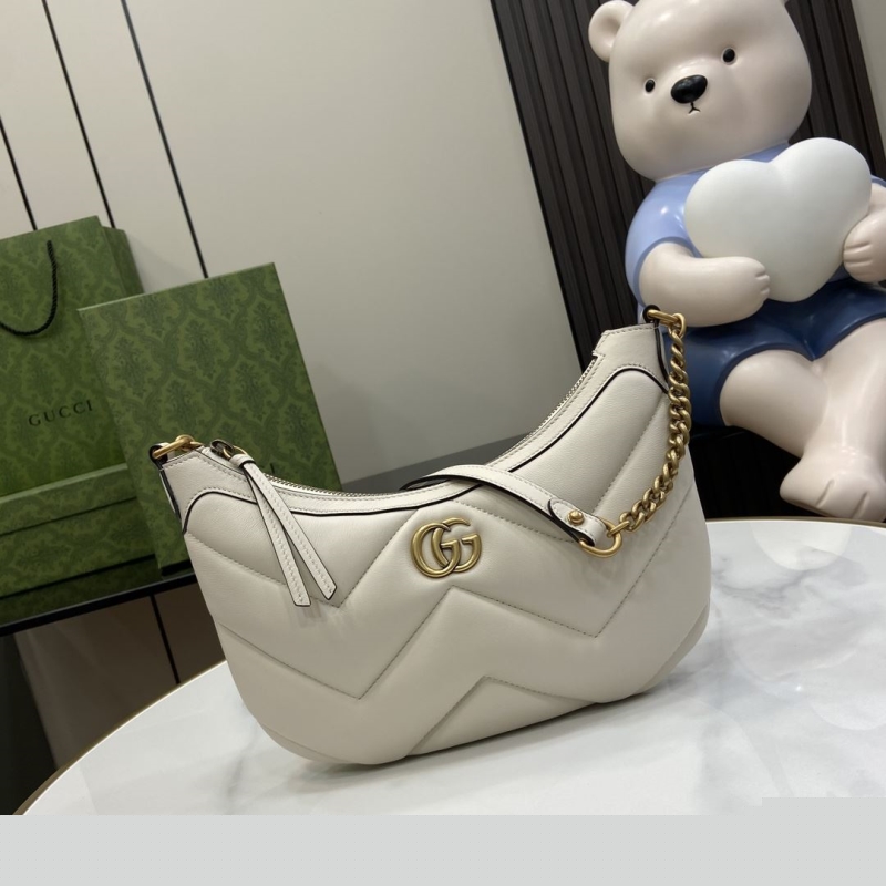 G*u*i top handle bags